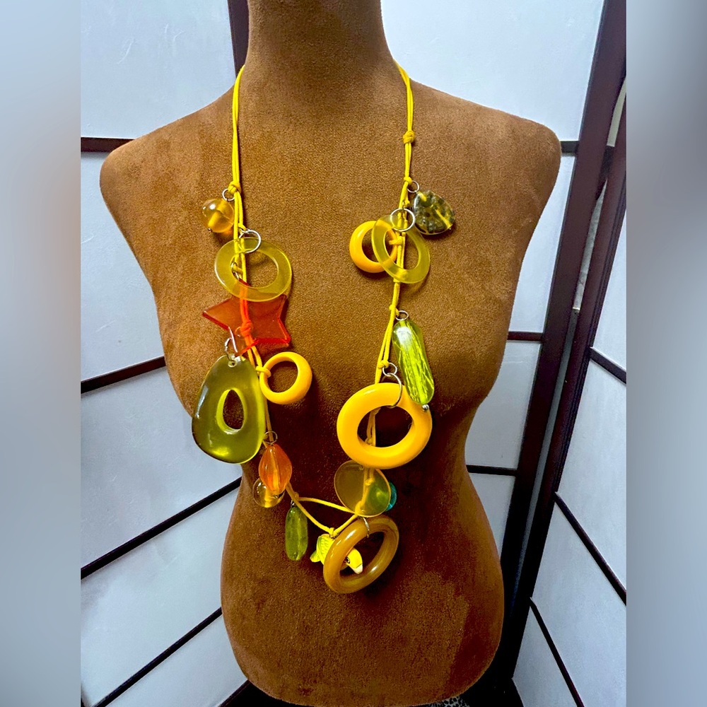 Whimsical yellow rope, acrylic and wood with a little yellow bird